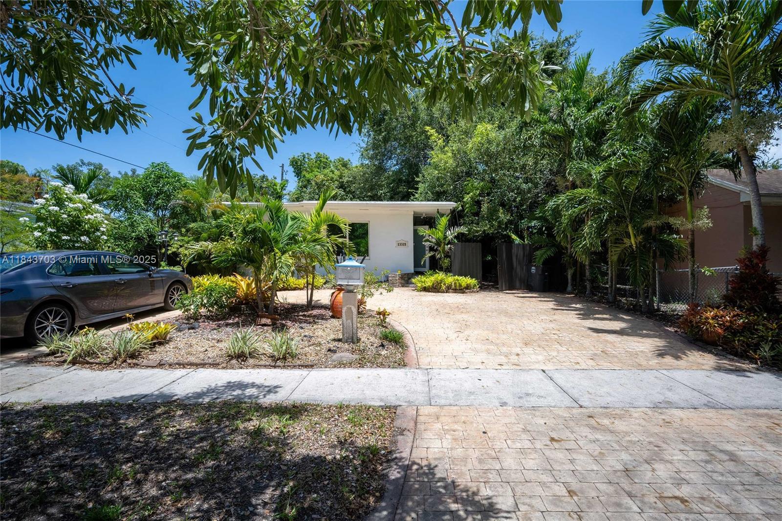 THIS IS A VERY COZY AND CHARMING HOUSE IN THE HEART OF NORTH MIAMI. IT OFFERS: FIVE YEARS OLD ROOF, REMODELED KITCHEN, IMPACT WINDOWS, CEILING FANS, CIRCULAR DRIVEWAY, BEAUTIFUL LANDSCAPING, A GREAT AND LARGE COVERED PATIO WITH A BUILT-IN MASONRY GRILL / BARBECUE, PLUS TREES, PLANTS, FLOWERS, AND TWO CEILING FANS, PERFECT FOR ENTERTAINMENT. ALSO A SHED FOR SOTAGE, AND MORE. PROPERTY LOCATED IN A BIRD SANTUARY NEIGHBORHOOD. PLEASE CONTACT L.A. FOR SHOWING INSTRUCTIONS. SELLER MOTIVATED!