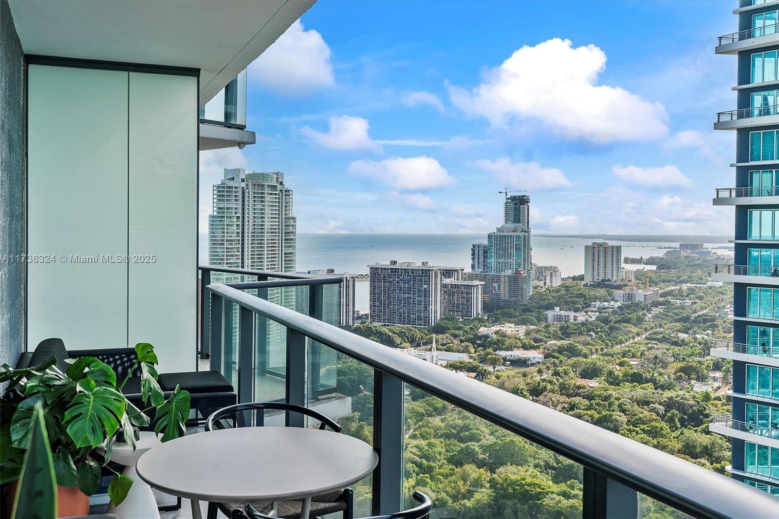 ASSUMABLE VA LOAN, LESS THAN 3% INTEREST RATE(IF QUALIFY) Welcome to this sleek and modern 1-bedroom, 1.5-bath condo in the heart of SLS Brickell, offering 649 Sq Ft of stylish living space. Built in 2016, this home boasts stunning skyline and bay views. Recent upgrades include ceiling lamps, contemporary bathroom fixtures, a kitchen equipped with Bosch appliances and sub zero fridge, and a Google Nest thermostat. Additional features include a custom built walk-in closet, and 1 parking spot assigned. Residents enjoy access to luxurious amenities, including two infinity pools with cabanas, exclusive resident access to sky deck pool, a rooftop pool, fitness center, spa, party room, Rosa Negra restaurant on site, and a private theater. Plus, only a few blocks from Brickell city center.