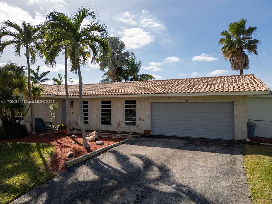 Nestled in the serene and highly sought-after neighborhood of Palmetto Bay, and on a cul-de-sac, this 4/3 offers comfort, style, and convenience. With just over 2,000 sq. ft. of living space (plus a garage under AC) on an expansive 17,640 sq. ft. lot. Inside, you’ll find a thoughtfully designed layout with spacious bedrooms and living areas. Recent upgrades include a brand-new AC system, a refinished pool, fresh exterior paint, a modernized electrical panel, and a new flat roof over the terrace. Located near top-rated schools, shopping centers, and dining options. Don’t miss the opportunity to own this beautifully updated gem in Palmetto Bay! 
OPEN HOUSE: Saturday, Jan.25, from 1 pm to 4 pm.