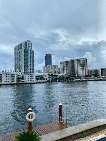Photo of 111 Golden Isles Dr #E4, Hallandale Beach, FL 33009 (MLS # A12070901)