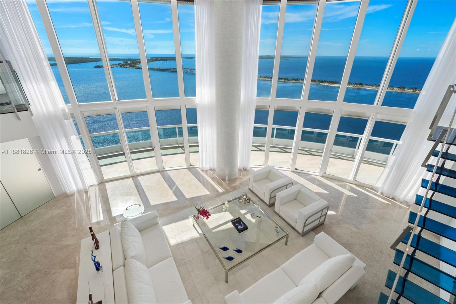 Breathtaking sweeping views of the Bay and Ocean greet you as you step into this highest 2 level townhouse on the 41st and 42nd floors. 5,730 sq ft interiors were redesigned by a renowned architect and feature contemporary sleek finishes such as cream marble flooring throughout, glass and stainless steel staircase, built-ins, customized walk-in closets, motorized shades and so much more. Soaring 20 ft ceilings and refined craftmanship convey a sense of elegance and glamour coupled with unsurpassed relaxation. Santa Maria offers 5 star amenities, a brand new fitness center, a bistro, lighted tennis court, marina access, 24 hour security and a totally redesigned pool and upper deck to be completed in the first quarter of 2026. Included: 3 assigned parking spaces and 1 storage unit.