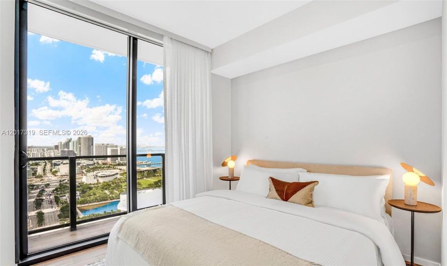 Turnkey short-term rental property in the heart of Downtown Miami. Discover this fully furnished 3- bedroom, 3-bathroom penthouse designed for elevated living in the heart of Miami. With floor-to-ceiling windows, this residence offers breathtaking views of Biscayne Bay and Downtown Miami, creating the perfect blend of sophistication and vibrant city energy. This modern retreat features tall ceilings, smart keyless entry, an Ecobee smart thermostat, and sleek contemporary finishes throughout. Residents enjoy access to resort-style amenities, including a pool deck & fitness center all while being steps away from world-class entertainment.