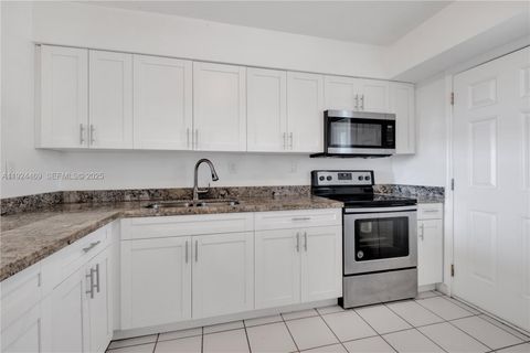 Photo of 1140 NE 191 St #24, Miami, FL 33179 (MLS # A11924469)