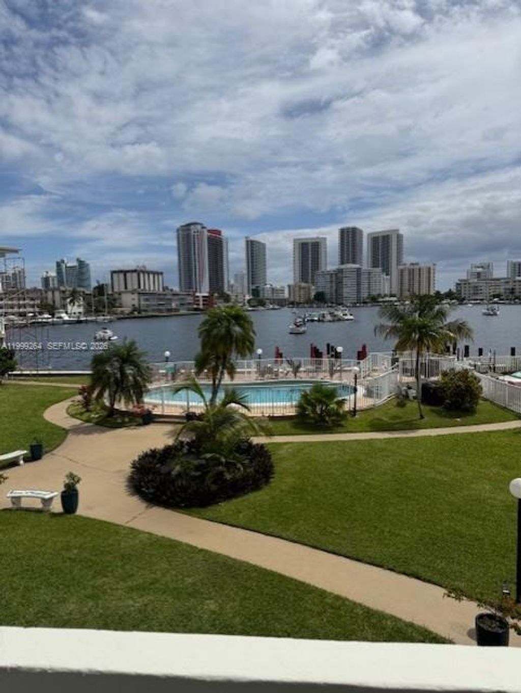 Photo of 450 Golden Isles Dr #2G, Hallandale Beach, FL 33009 (MLS # A11999264)