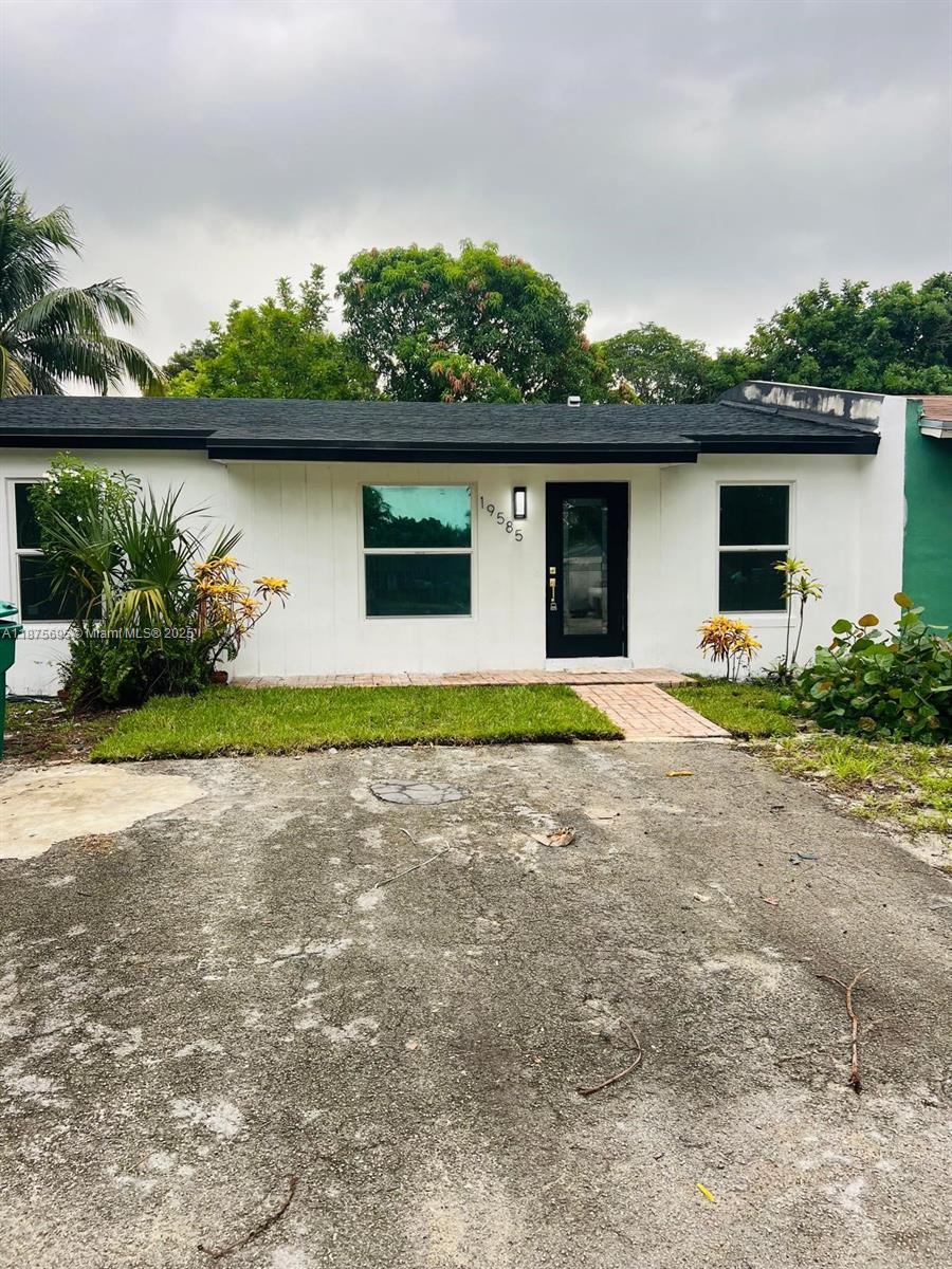 Beautifully remodeled single-family corner home featuring ceramic tile floors throughout, impact windows, and a brand-new roof. This property offers 3 bedrooms and 1 bathroom, with plenty of natural light and an open layout. Conveniently located just minutes from Hard Rock Stadium, shopping, and major highways. Some final touches are being completed during the selling process. Don’t miss this opportunity!