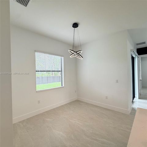 Tiny photo for 1047 E Merry St, Lehigh Acres, FL 33974 (MLS # A12027248)