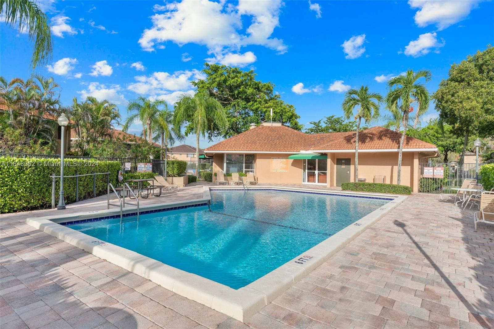No assessments and plenty of reserves to support financing. Experience the ultimate in affordability with extremely low HOA fees in this beautifully remodeled 2-bedroom, 2-bathroom home, perfect for first-time buyers or investors. Featuring porcelain wood-look tile throughout, renovated bathrooms and kitchen, and an open kitchen ideal for cooking and entertaining, this property is a must-see. Enjoy quality time with family and friends in the spacious living area, screened patio, or nearby community amenities, including a pool, tennis court, and clubhouse, all just steps away with ample guest parking.