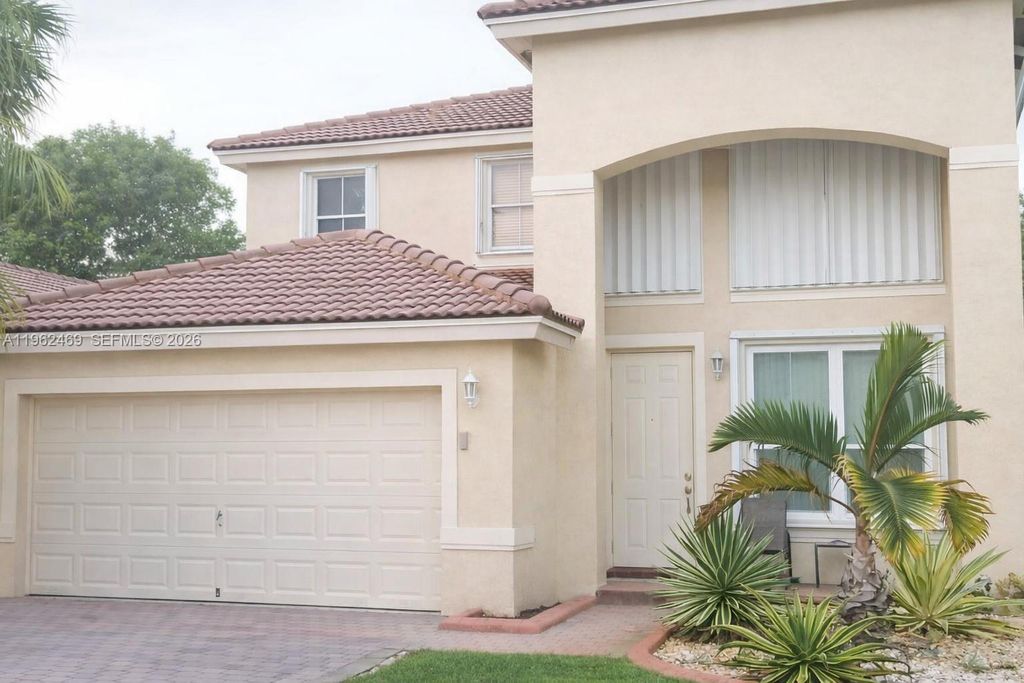 Photo of 7645 NW 19th Ct #1, Pembroke Pines, FL 33024 (MLS # A11962469)