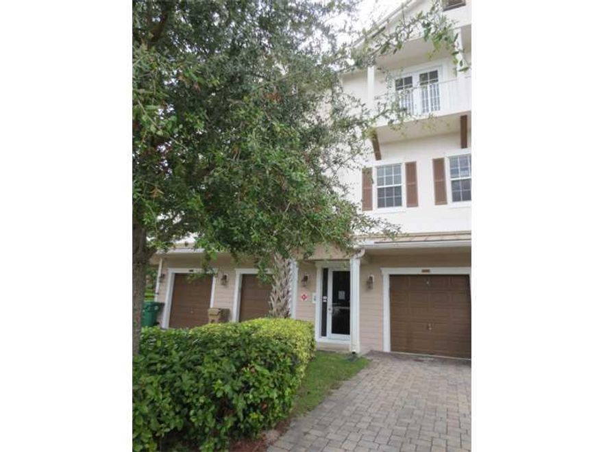 Luxury without upkeep!! Just bring your tooth brush and move in this spacious Tri-Level townhome with two masters, NEW carpet, tiled balcony with lake view, one full car garage all located near major highways, shopping and entertaining. This is a Homepath  Property.