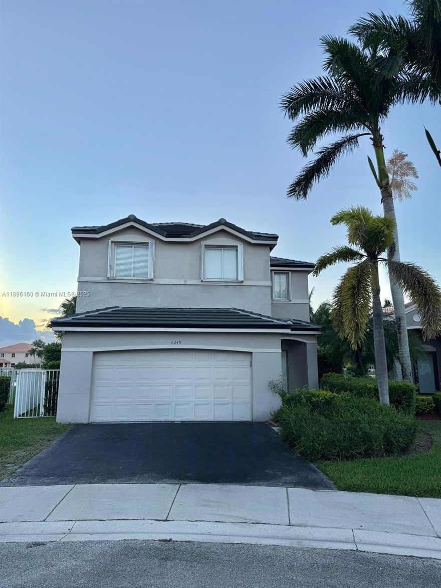 Don’t miss the opportunity to view this beautiful home located in the highly sought-after gated community of The Ridges in Weston. This spacious and well-maintained property features four bedrooms, two and a half bathrooms, and a modern kitchen with elegant granite countertops. Step outside to enjoy serene lake views from your private pool and spa — perfect for relaxing or entertaining guests. With brand new vinyl flooring and a new roof, this home is truly move-in ready. Conveniently located near Weston’s top-rated schools, it offers the perfect blend of comfort, style, and everyday convenience.