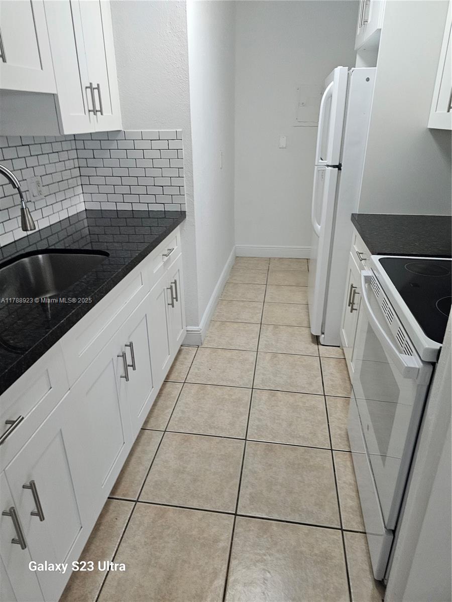 SUNSET PALMS WEST CONDO - Residential