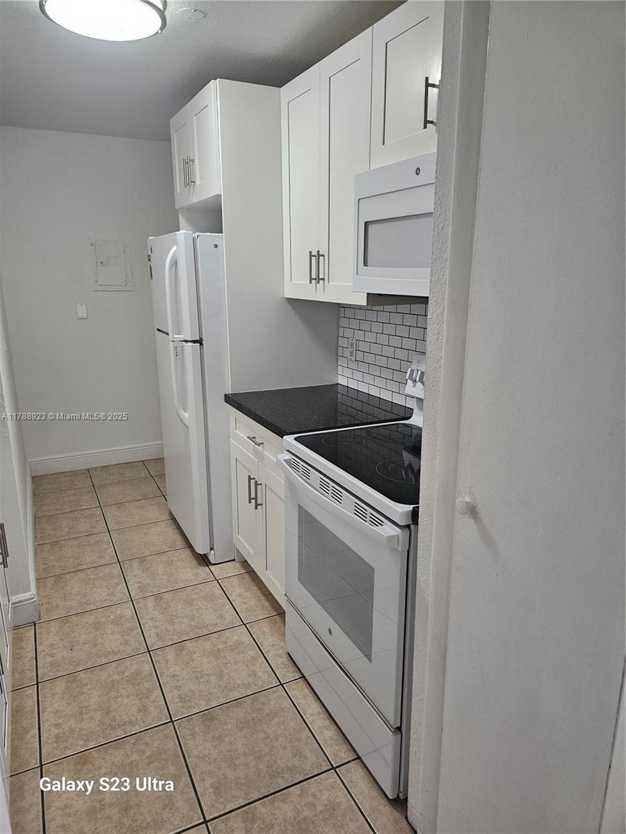 SUNSET PALMS WEST CONDO - Residential