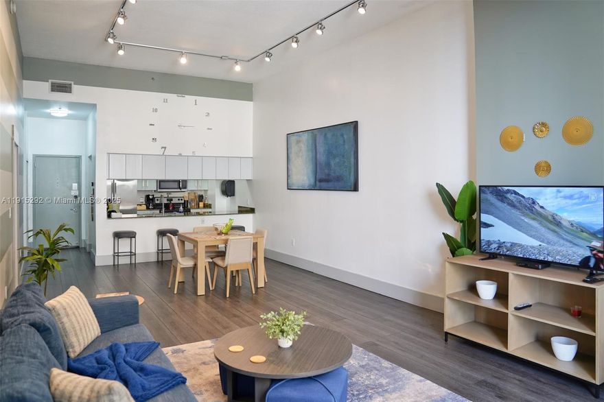 This 2-bedroom, 1-bath condo with no rental restrictions is ideal for investors or a vacation home, perfect for maximizing Airbnb revenue. Located on the 14th floor, it features unique double-high ceilings—the only layout of its kind in the building—and sits on the Amenity Level with direct access to two pools, a gym, restaurant, and kids’ area. The modern unit includes a stainless steel and granite kitchen, wood floors, stylish furnishings, and a balcony with water and city views. Parking is just one floor below. The Club at Brickell offers 24/7 concierge, valet, fiber-optic internet, and close proximity to dining, shopping, beaches, and the airport