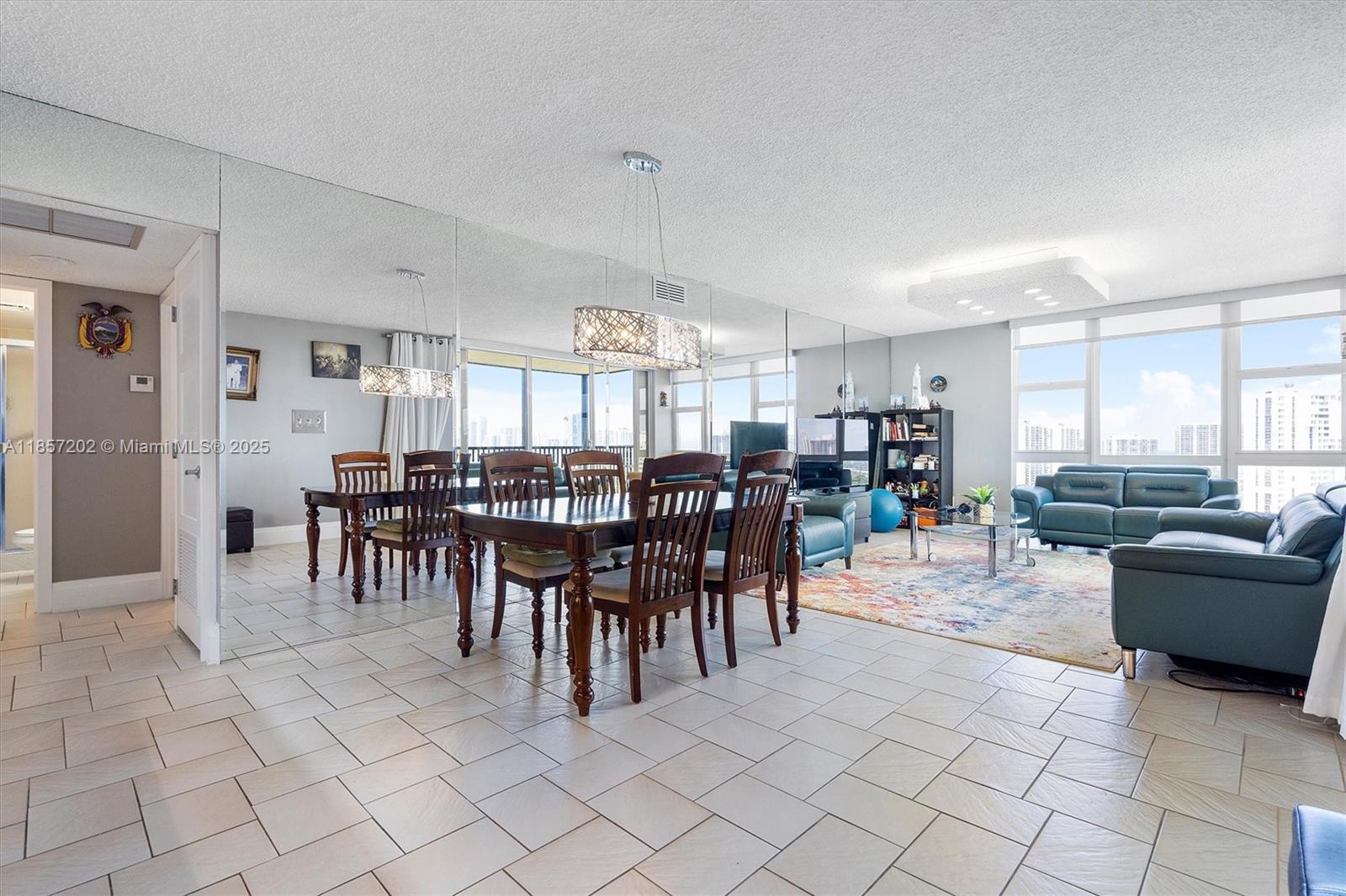 Welcome to Coronado Towers III, Unit 1933 (corner unit) located in the beautiful City of Aventura, Florida. This unit offers an ample floor plan and amazing views of the Sunny Isles skyline, the Soffer and Miller Golf courses at the JW Turnberry, and partial ocean views! As soon as you step in, you are welcomed by a hallway that leads into the spacious living and dining area, the kitchen is adorned with light-color cabinetry and backsplash, two spacious bedrooms and screened balcony perfect to enjoy sunrises. The building's lobby was recently updated, and it also features a pool, gym area, guest parking and more! This unit is a great option for those seeking amazing views and