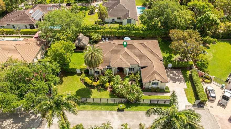 Tucked away in a private cul-de-sac with only 6 houses, this home is the ultimate "quiet luxury" find in coveted The Falls 33176. Sitting on 17,489 sq ft fenced-in gated lot with lime tree, this home is that rare spot where you get total privacy and high-end living NO HOA. Built in 1998 & kept in top shape, the upgrades are serious: kitchen is a chef’s dream - over $30k in upgrades with all new 2024 Thermador appliances & chef-preferred gas stove. Kitchen opens to Florida room with breakfast nook, perfect for coffee, wine, homework. Huge master overlooks pool, spacious enough for "king size everything", leading to his and hers walk-in closets. Ensuite master bath is gorgeous: 2 sink vanity, glass enclosed large shower, separate tub and a most unusual surprise: your very own sauna room experience!
2021 roof, new 2025 pool pump, additional insulation, covered terrace plus patio hut. Two car garage plus space for storage/3rd car. "BEST OF" Miami location, top rated public schools (Vineland K-8 & Palmetto Sr) plus private & charter school options. Restaurants, shopping and dog park plus less than a 10 minute drive Baptist Hospital Main, 1.5 miles to Jackson South, Coral Gables & South Miami. You’re perfectly positioned in this move-in ready home - just bring toothbrush and a long list of weekend adventures. Whether you’re relocating from another state, country or locals looking for that perfect upgrade THIS six-home enclave IS IT!. 24 hours' notice for a private showing a must