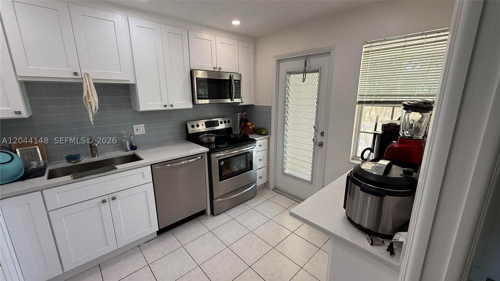 Photo of 2901 S Palm Aire Dr #408, Pompano Beach, FL 33069 (MLS # A12044148)