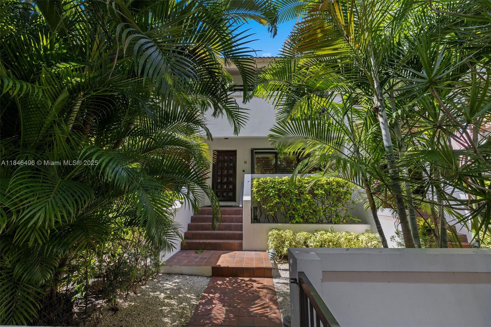 The ideal lifestyle in the heart of Coral Gables! This tastefully redesigned townhome at Biltmore Court Villas faces the beautiful, quiet, & tree-lined, Almeria Avenue. The open-concept living w/ a chef’s gourmet kitchen features custom cabinetry, sleek marble countertops, high-end stainless-steel appliances and storage galore. The white cabinetry theme is continued in both en-suite bathrooms and the downstairs half bath. Elegant finishes throughout: French oak hardwood flooring, plush carpet in bedrooms, a rebuilt staircase, new HVAC and electrical panel from the 2018 renovation. Convenient amenities: Elevator, 2 dedicated parking spaces, generous 40 ft storage unit, access to pool & BBQ in common area. Prime location: Minutes to Miracle Mile, UM, dining, shops, parks, trolly, and metro.