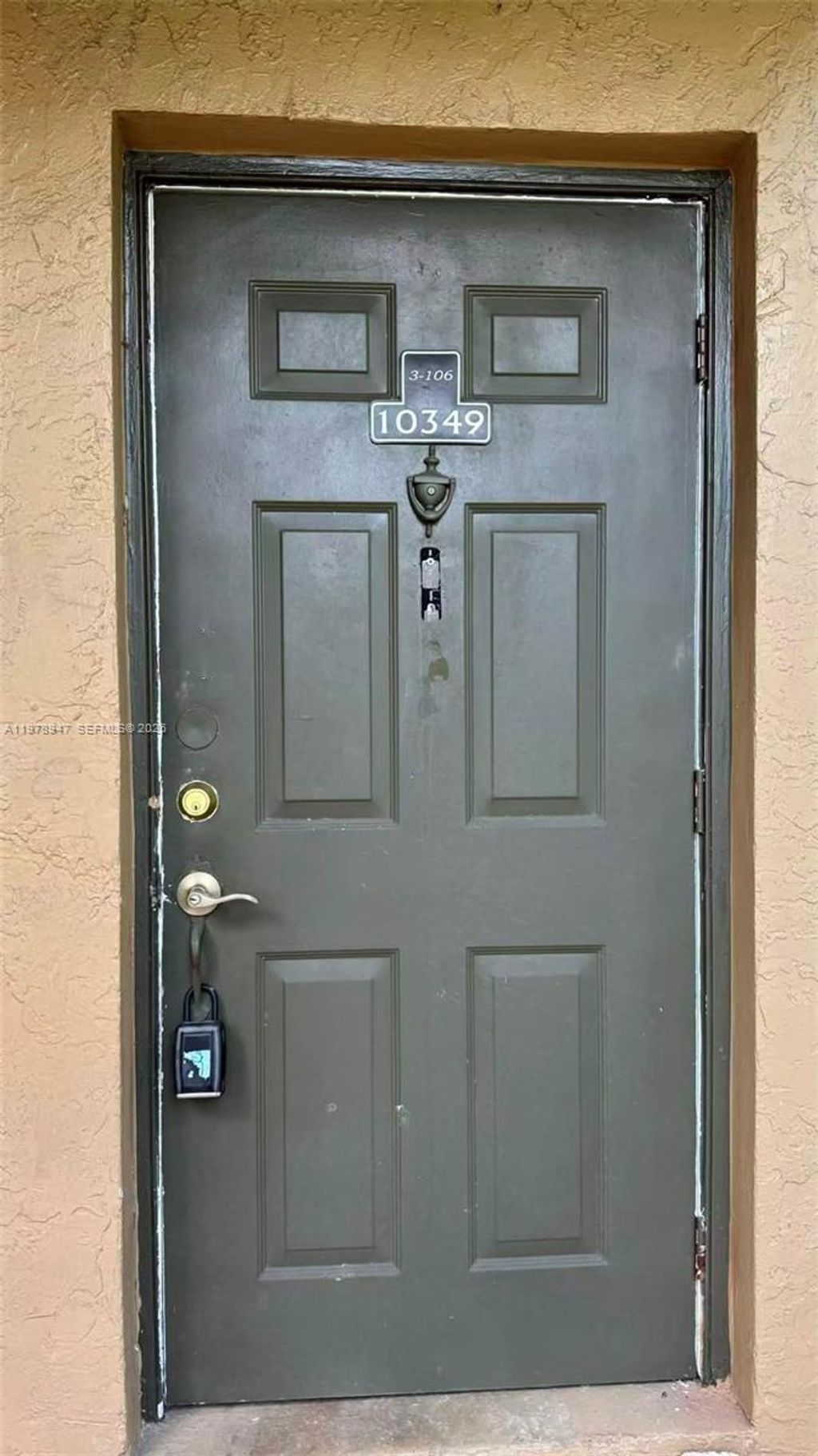 Photo of 10349 NW 8th St #106, Pembroke Pines, FL 33026 (MLS # A11978947)