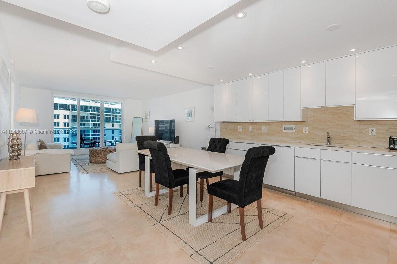 Gorgeous 1 Bedroom + 1 Den/Bedroom, 1 bath residence with balcony and ocean views situated in one of South Beach’s premier resorts. Updated tile floors and kitchen. Fully furnished in a warm, beach house aesthetic. Electricity, cable, WiFi, water and valet with 1 parking spot included. Laundry room on every floor. Roney Palace Amenities Situated inside the same building as the luxurious 1 Hotel, Roney Palace residents enjoy the best of South Beach with access to 3 oceanfront swimming pools, a hot tub and beach service.Valet parking, full-time security, laundry on every floor, onsite management office. Pricing is dynamic and may vary according to seasonal demand, lease commencement date, and lease term. Please contact listing agent for current availability and pricing