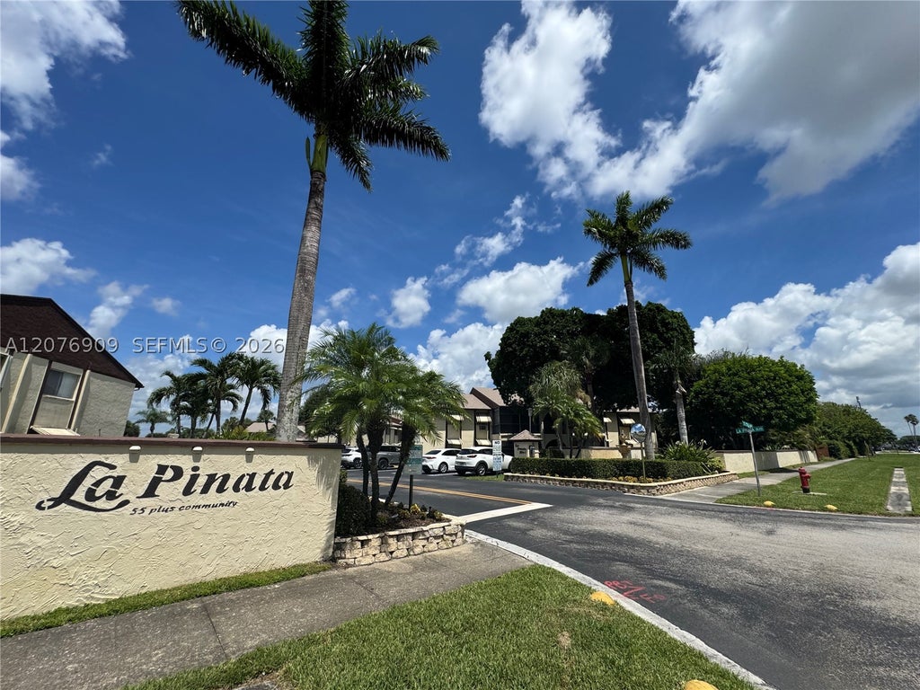 Photo of 5773 La Pinata Blvd #A-1, Green Acres, FL 33463 (MLS # A12076909)