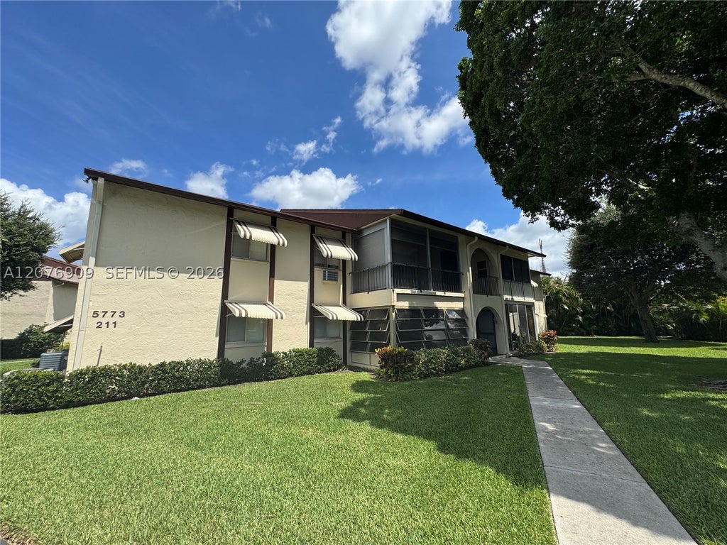 Photo of 5773 La Pinata Blvd #A-1, Green Acres, FL 33463 (MLS # A12076909)
