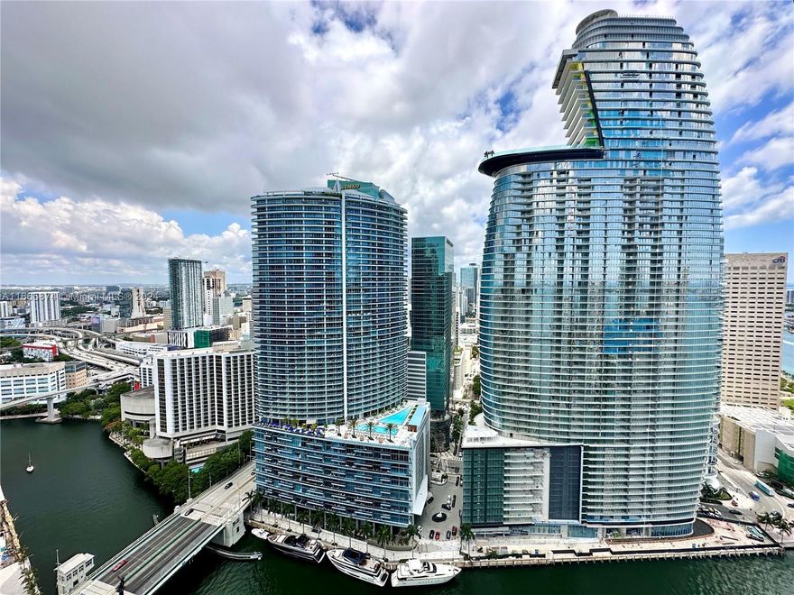 Priced to Sell!! This impeccable unit on the 40th floor offers breathtaking views of the Miami River and the city skyline. Located in the heart of Brickell, just steps from Brickell City Centre, it boasts floor-to-ceiling windows and an expansive layout with 940 interior square feet and 142 exterior square feet, as per the developer’s floor plan. The luxurious ICON Brickell complex features top-rated on-site dining, a renowned pool deck with an Olympic-sized pool, the Icon Café by the pool, and an extraordinary two-story spa and fitness center. The unit also includes one assigned parking space, offering the ultimate Miami lifestyle experience.