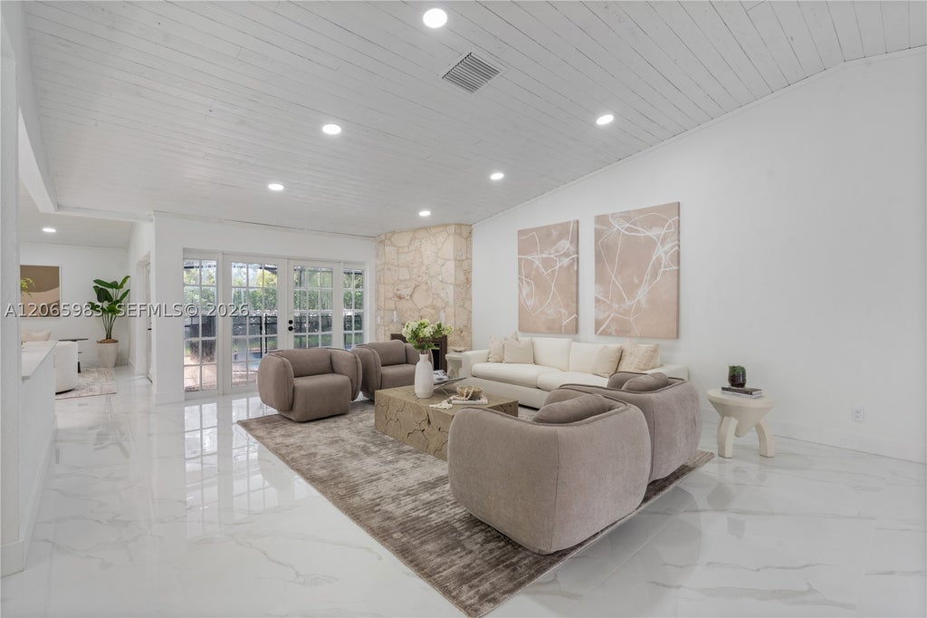 Photo of 695 NW 107th Ln, Coral Springs, FL 33071 (MLS # A12065983)