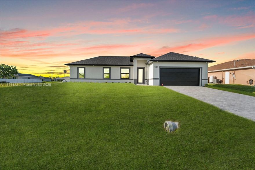 Discover this modern Cape Coral home featuring 4 bedrooms, 2 bathrooms, and a 2-car garage, perfectly located near Chiquita Blvd and Pine Island Road, just minutes from shopping, dining, and entertainment. Offering 1,240 sq ft of living space (1,884 sq ft total), it showcases an open-concept design with a kitchen boasting quartz marble-style countertops, a central island, stainless steel appliances, wood cabinetry, and stylish pendant lighting. The home is enhanced with glossy porcelain floors and impact-resistant windows and doors for brightness, safety, and style. Plus, enjoy the benefits of NO HOA and NO Flood Zone. Don’t miss this opportunity—schedule your showing today!