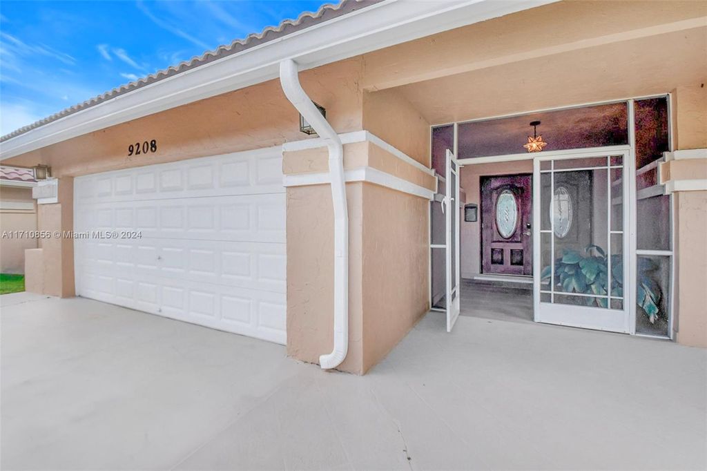 Photo of 9208 Sun Pointe Dr, Boynton Beach, FL 33437 (MLS # A11710856)