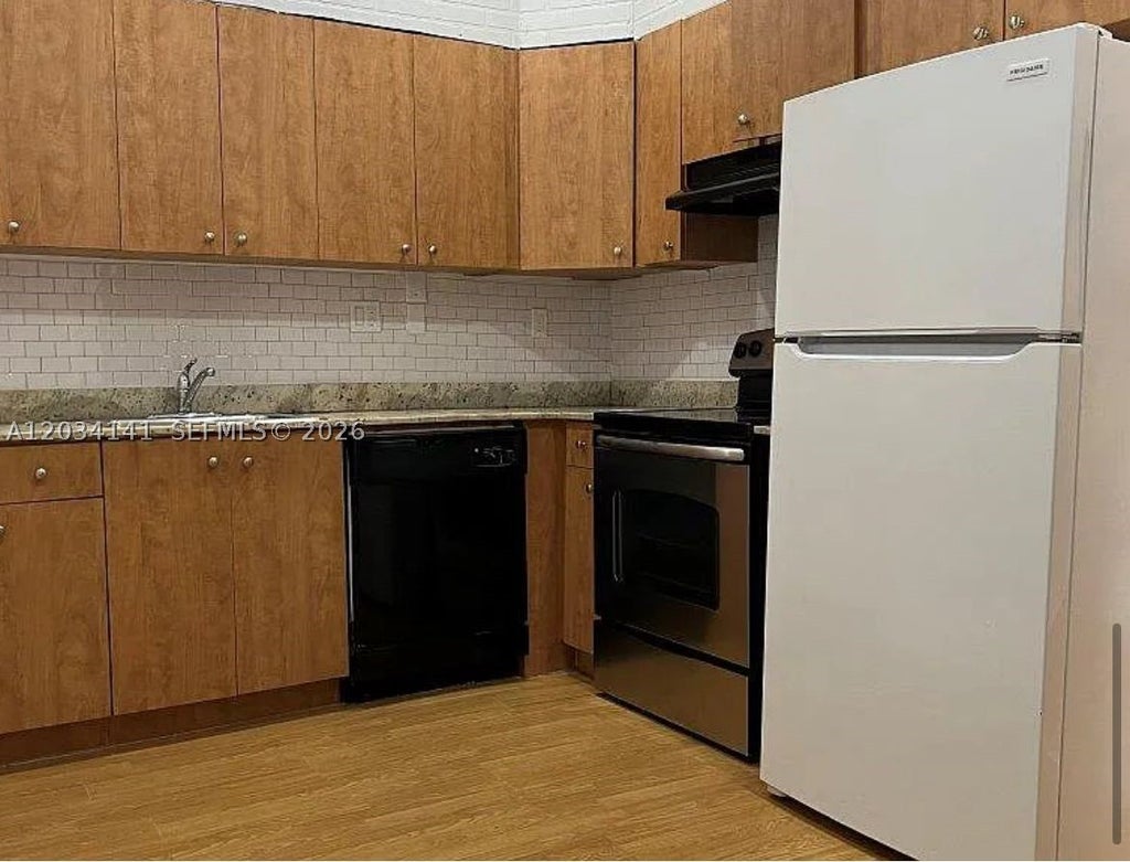 Photo of 2205 Roosevelt St #3, Hollywood, FL 33020 (MLS # A12034141)