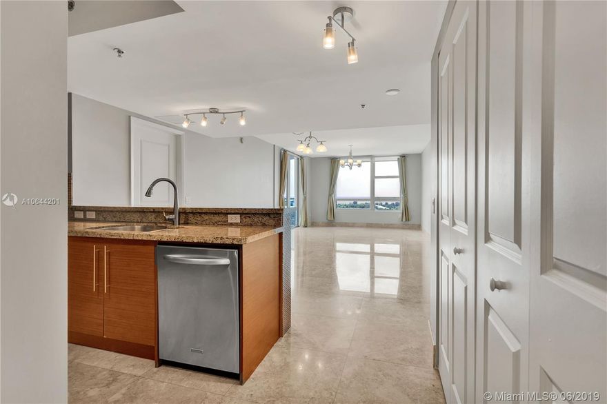 MOTIVATED SELLER, BRING ALL OFFERS! Breathtaking views from 20th floor CORNER UNIT with TWO terraces. 3 beds with CUSTOM CLOSETS and 3 FULL baths. Stunning custom MARBLE FLOORS throughout. STAINLESS steel appliances, GRANITE counters, freshly painted and has a brand new washer dryer - vacant and ready to move-in. TWO parking spaces in SECURE GARAGE directly in front of the elevator. Tao DOES NOT REQUIRE 20% down, so EASY to finance. RESORT AMENITIES: Concierge, heated lagoon pool, 10 person hot tub. Private key fob elevators, modern gym, business center, tennis courts, putting green, billiard room. Function room perfect for social and business occasions. Walking distance to Sawgrass Mall and BB&T Center. 1 minute to Sawgrass Expressway and I-75.