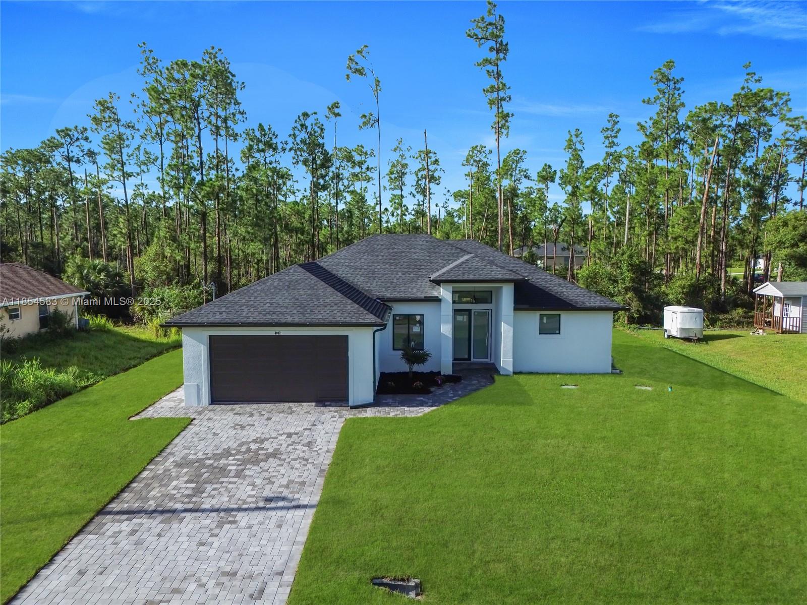 Welcome to this spectacular new construction home!
This incredible new construction 3-bedroom, 2-bathroom home with a den will leave you speechless! Located on a premium corner lot, this property offers the perfect combination of luxury, comfort, and privacy.
The house is designed with safety and energy efficiency in mind, featuring impact windows that provide total peace of mind. The modern design is complemented by a kitchen with stainless steel appliances and high-end finishes that create a "wow" factor from the moment you walk in. It's the ideal opportunity for a family looking for a brand-new, move-in-ready home. You have to see it in person to believe it!