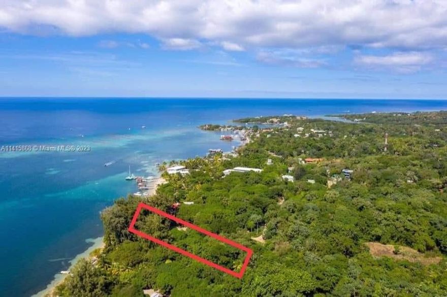 This hidden gem boasts 11.337 very private & beautiful acres surrounded by the Caribbean Sea. Wooded with tropical trees, and 180-degree breathtaking views of the beaches within the community of famous West End of Roatan Island-Honduras. The lot is located on the west side of the island with an active night life surrounded by hotels, restaurants and bars , the island has paved main roads and just some few miles from the international airport. If your vision has you owning land in the Caribbean, then this property is your one-of-a-kind opportunity for sure! It lot has lot of potential and  all the characteristics to develop a 5 star hotel or develop a residential community.