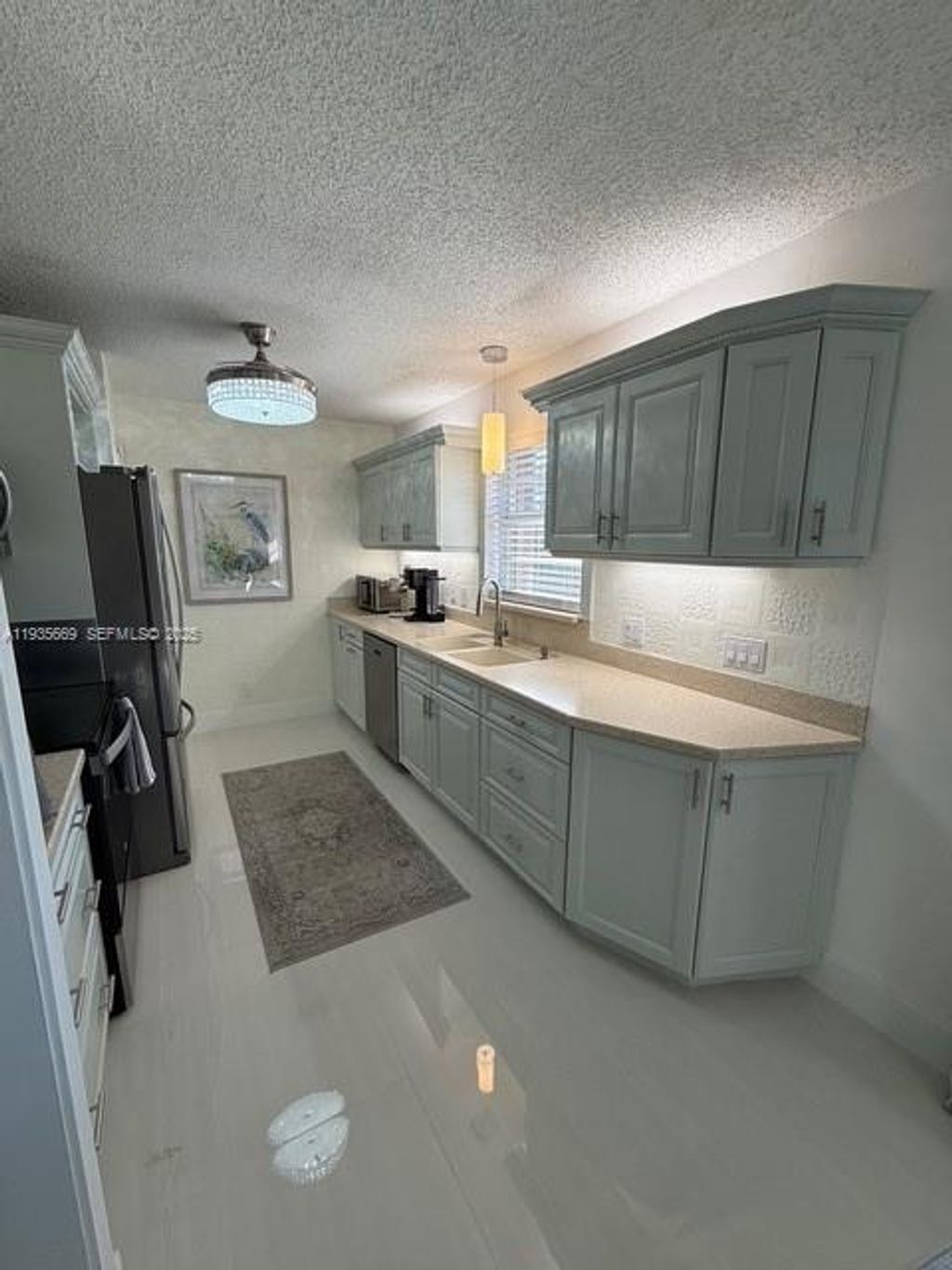 Photo of 17 Lake Vista Trl #201, Port St Lucie, FL 34952 (MLS # A11935669)