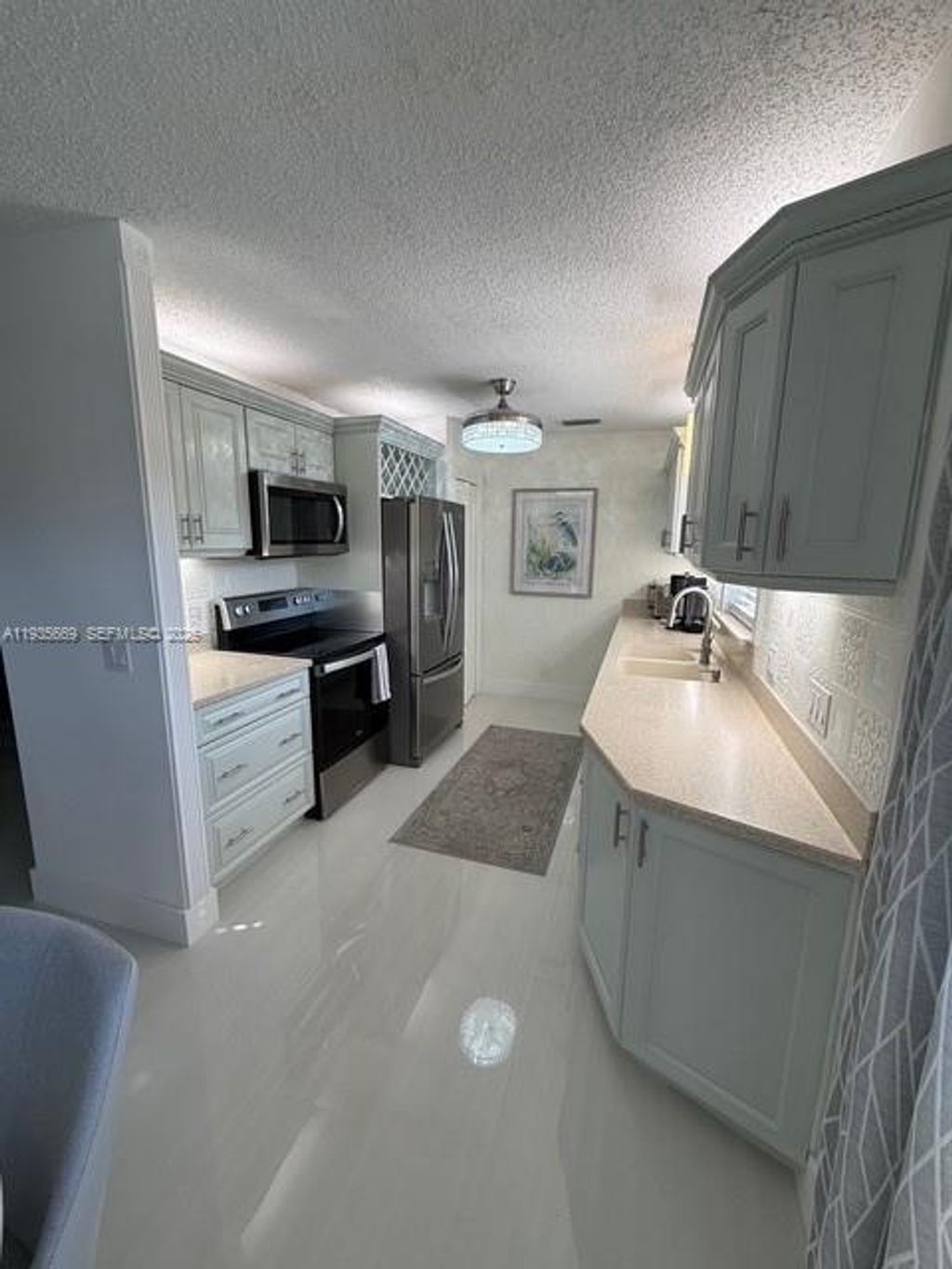 Photo of 17 Lake Vista Trl #201, Port St Lucie, FL 34952 (MLS # A11935669)