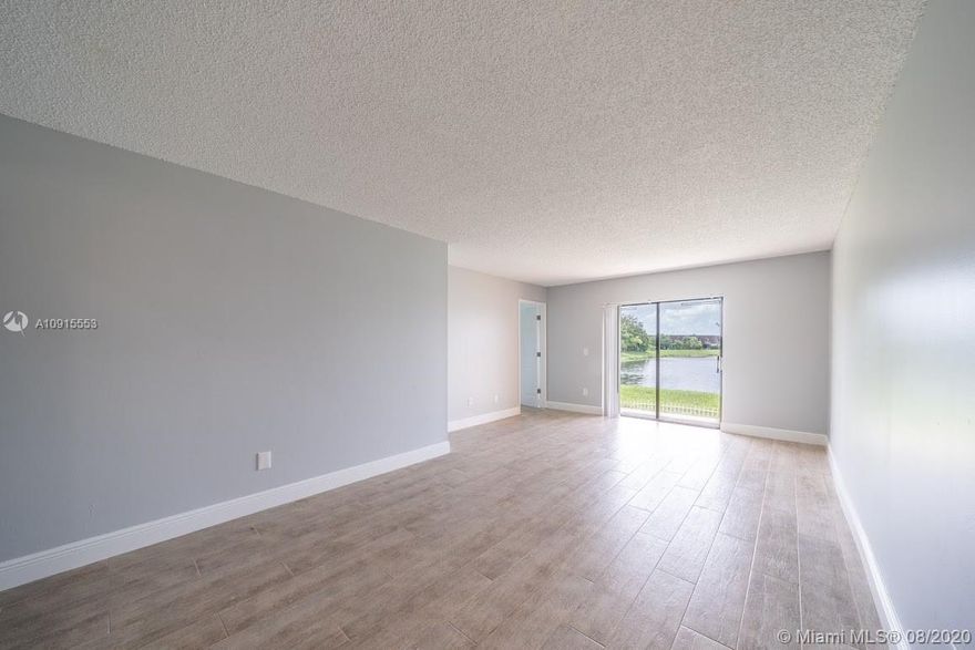 Beautifully remodeled 2/2 condo in the highly sought after community of Lago Grande. Brand new kitchen,bathrooms, flooring,freshly painted and much more. Gorgeous lake view. Washer/dryer inside of condo. Centrally located near major expressways,shopping, and much more. Call to schedule your showing today!
