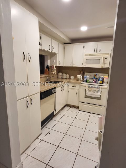 Tiny photo for 900 Colony Point Cir #107, Pembroke Pines, FL 33026 (MLS # A12042083)