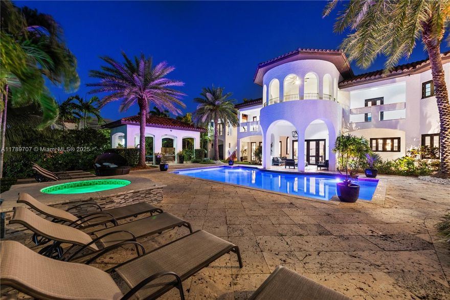 Step into the grandeur of this Mediterranean-style estate, boasting 9 luxurious bedrooms and 9 bathrooms, complete with a charming 2 bed/1 bath guest cottage and a sumptuous waterside pool with a cabana. This property offers grand living with 25 ft ceilings, a state-of-the-art movie theater, and a majestic 1,000 sf master suite. The open gourmet kitchen, equipped with double appliances, flows into a bar area, perfect for entertaining. With a 4-car garage, summer kitchen for alfresco dining, and a new seawall featuring a 20,000 lb boat lift, offering Driving Directions:140 feet of waterfront views and direct bay and ocean access, all within proximity to Miami's finest attractions.
