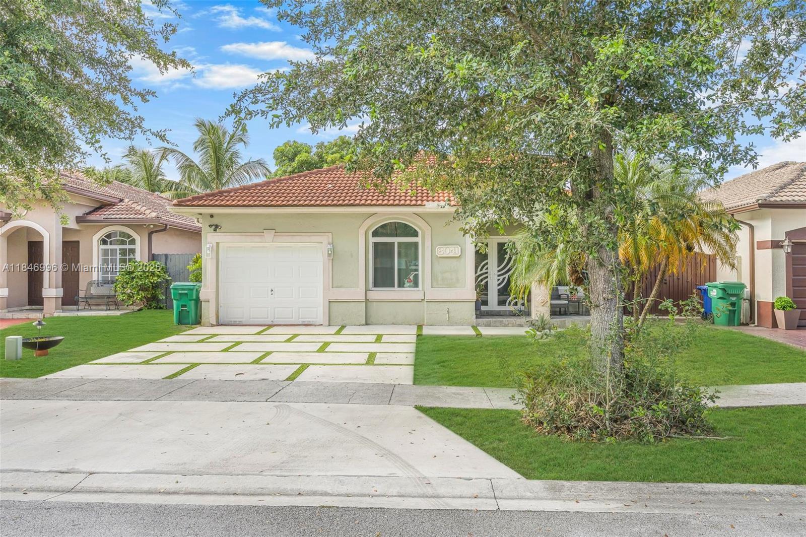Spacious and well-maintained 4-bedroom, 2-bath single-family home featuring vaulted ceilings, energy-saving solar panels, and laminate flooring throughout. Enjoy a bright open layout, a 1-car garage, and a large covered terrace with beautiful wood ceilings and crown molding—perfect for outdoor living. The backyard has ample space for a pool and includes an exterior storage closet. Centrally located near top-rated schools, shopping, dining, and major highways for an easy commute. No HOA, giving you flexibility and freedom. This home is move-in ready with great curb appeal, nestled in a desirable, quiet neighborhood. A perfect blend of comfort, convenience, and value—ideal for families or anyone looking to enjoy the South Florida lifestyle.