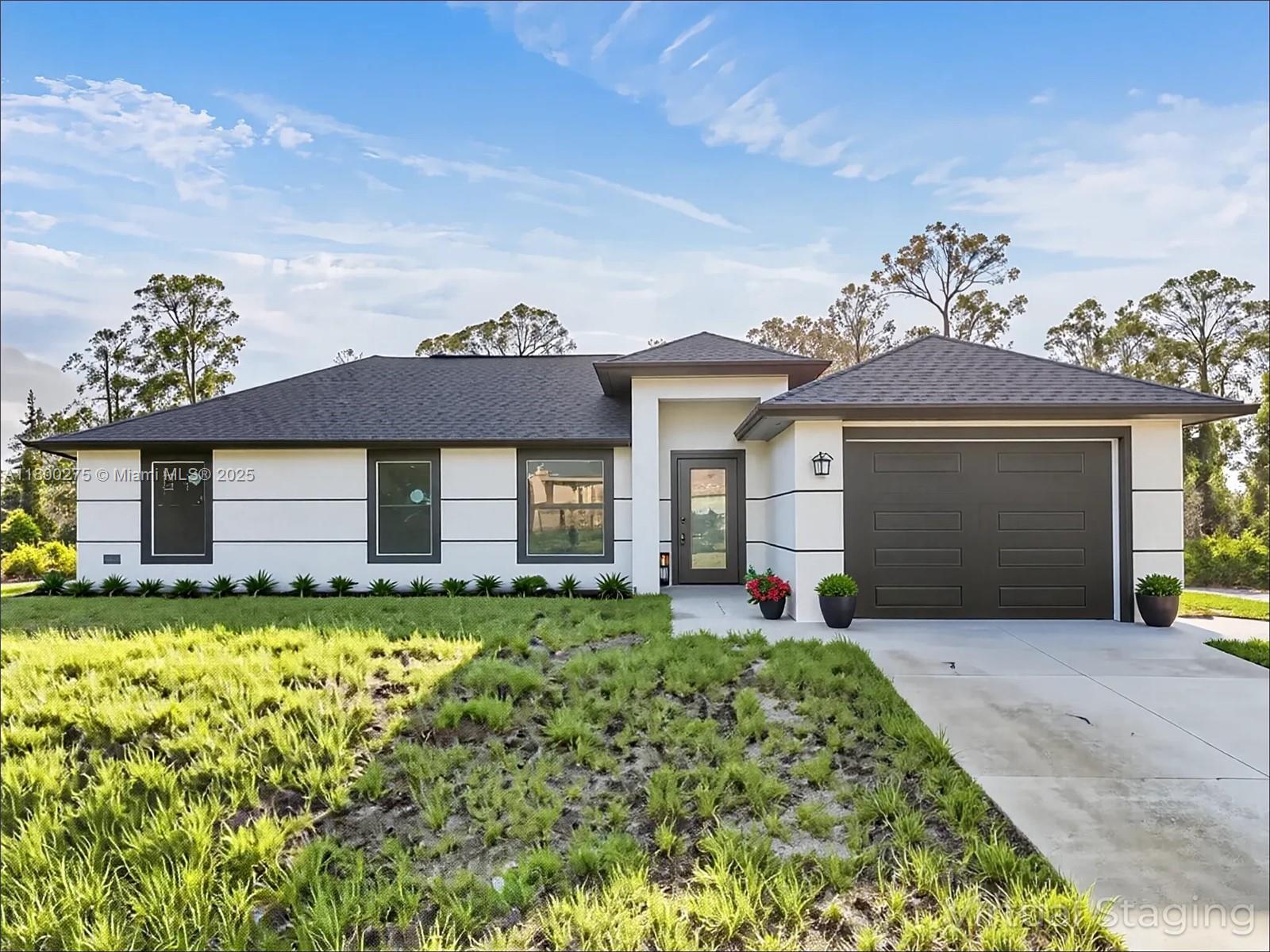 Property for Sale at 817 Moore Ave, Lehigh Acres, Lee County, Florida - Bedrooms: 3 
Bathrooms: 2  - $329,900