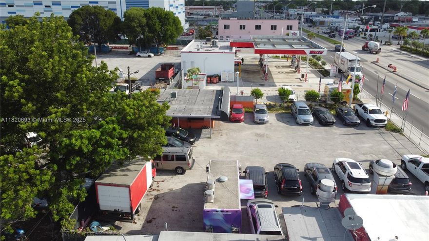 This is a rare opportunity to acquire two contiguous commercial parcels totaling 9,216 square feet of land with high visibility frontage along NW 27th Avenue—a key north-south artery connecting central neighborhoods, including Allapattah, Brownsville, and Liberty City. The property includes a freestanding commercial building currently configured for retail and showroom use, along with ample on-site parking and signage exposure. Strategically positioned on a signalized corner at NW 27th Avenue and NW 22nd Street, the site benefits from excellent vehicular access and public transit connectivity. It is located just minutes from Miami International Airport, SR-112, Wynwood, and Downtown Miami. Zoned BU-3