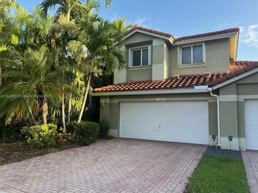 Photo of 12680 NW 56th Dr #12680, Coral Springs, FL 33076 (MLS # A11817873)