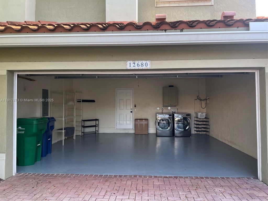 Photo of 12680 NW 56th Dr #12680, Coral Springs, FL 33076 (MLS # A11817873)