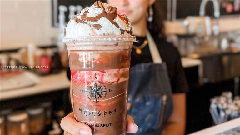 This business is perfect for a local or investor buyer! With great exposure on social media platforms and well known to locals and surrounding neighborhoods' customers. As their name suggests, "Main Spot" is where entire families can enjoy a variety of drinks, including smoothies, coffee, hot and cold options, all with protein ingredients provided by Natural Life. This brand offers customized recipes, ensuring each delight is crafted to perfection.
The business not only serves specialty drinks but also sweet dishes for breakfast and lunch options.
This business is a proven success and can qualify for an investment Visa.
Located in a hot plaza at one of the most recognized growing neighborhoods, it's like living and working in the same place!