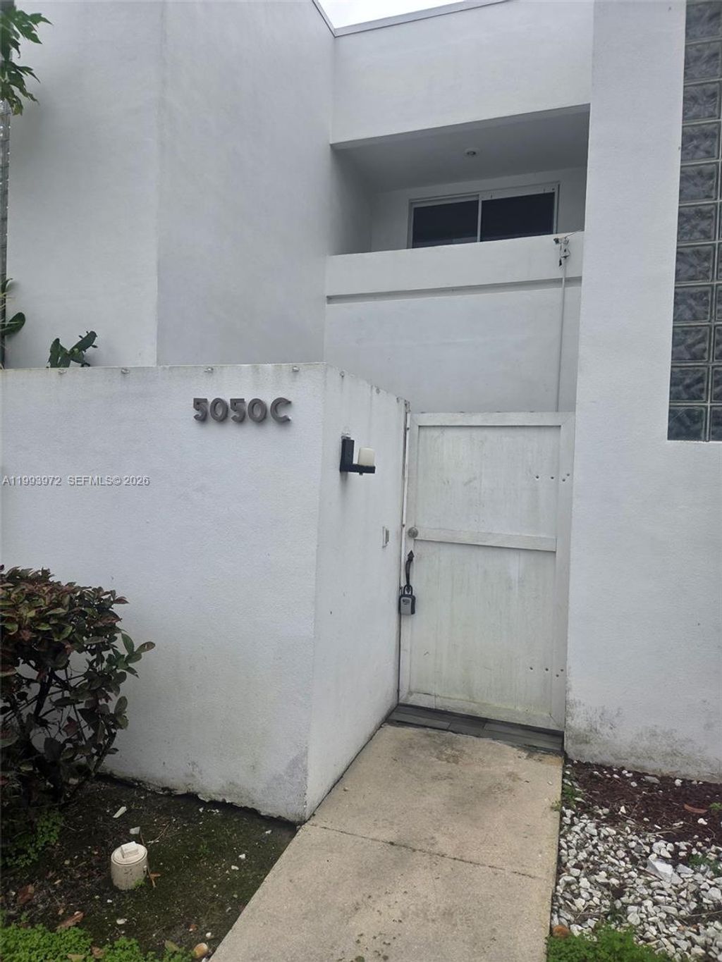 Photo of 5050 Elmhurst Rd #C, West Palm Beach, FL 33417 (MLS # A11993972)