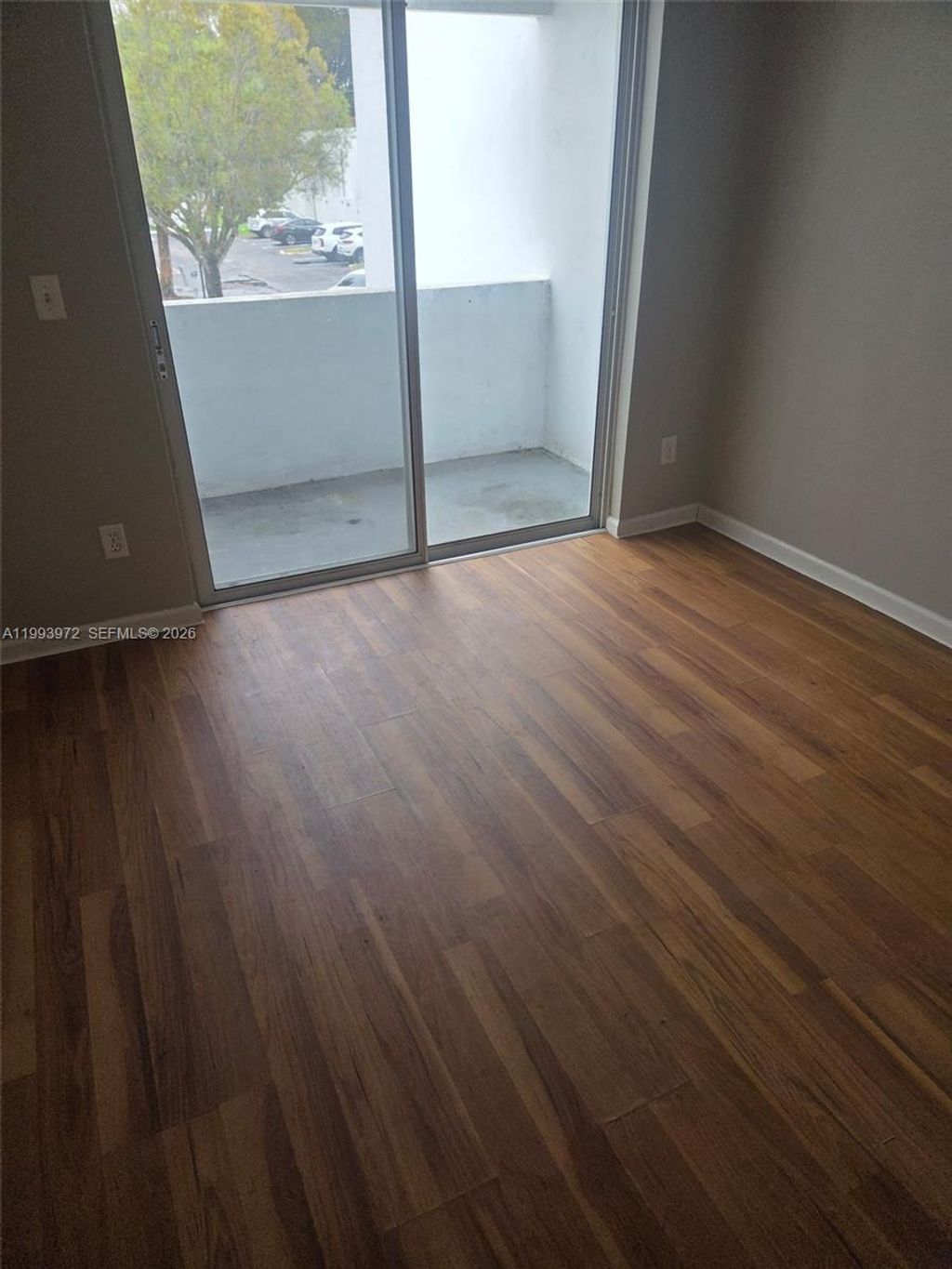 Photo of 5050 Elmhurst Rd #C, West Palm Beach, FL 33417 (MLS # A11993972)