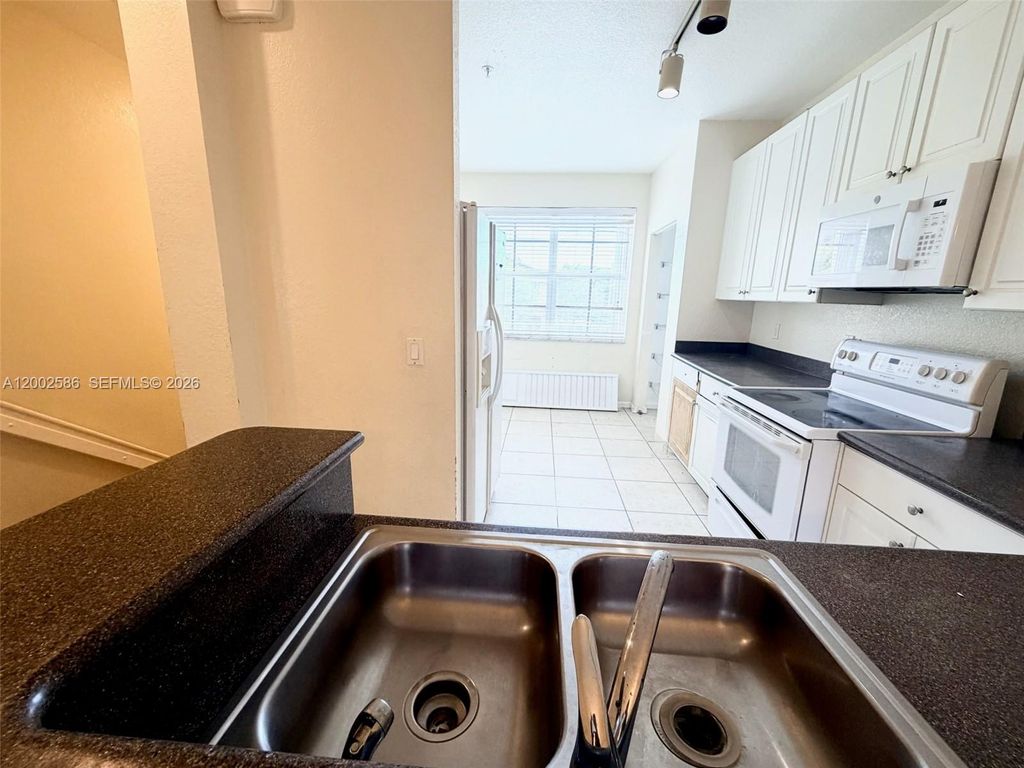 Photo of 1751 NE 6th St #1207, Boynton Beach, FL 33435 (MLS # A12002586)