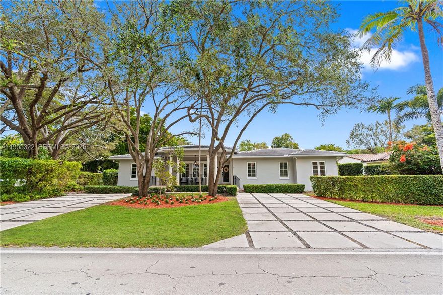 Classic Coral Gables elegance meets modern updates in this refined 4BD/3BA residence, featuring new impact windows & doors, a 3-year-old roof, rich wood floors, custom crown moldings with beautifully detailed wood trim throughout every window & doorway. Gracious living spaces include a formal living room, formal dining room, sun-filled family room, a kitchen w/ breakfast area—all overlooking a private terrace ideal for outdoor dining & entertaining. The desirable split-bedroom floor plan offers privacy and effortless flow, anchored by a grand primary suite with 2 oversized walk-in closets + 3 bedrooms & 2 baths. Situated on a corner lot with a 2-car garage, the home enjoys tranquil views of a brand-new park directly across the street, creating a serene and picturesque setting. Ideally located near UM, Riviera Country Club & Golf Course, The Biltmore Hotel, Merrick Park, dining & shops.  A rare opportunity to own a timeless, move-in-ready home in one of Coral Gables’ most coveted neighborhoods.
