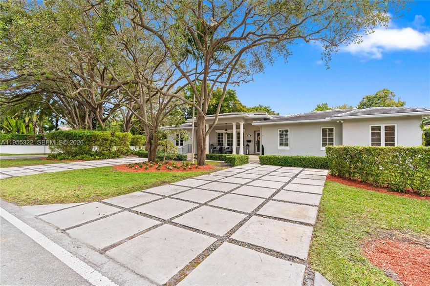 Classic Coral Gables elegance meets modern updates in this refined 4BD/3BA residence, featuring new impact windows & doors, a 3-year-old roof, rich wood floors, custom crown moldings with beautifully detailed wood trim throughout every window & doorway. Gracious living spaces include a formal living room, formal dining room, sun-filled family room, a kitchen w/ breakfast area—all overlooking a private terrace ideal for outdoor dining & entertaining. The desirable split-bedroom floor plan offers privacy and effortless flow, anchored by a grand primary suite with 2 oversized walk-in closets + 3 bedrooms & 2 baths. Situated on a corner lot with a 2-car garage, the home enjoys tranquil views of a brand-new park directly across the street, creating a serene and picturesque setting. Ideally located near UM, Riviera Country Club & Golf Course, The Biltmore Hotel, Merrick Park, dining & shops.  A rare opportunity to own a timeless, move-in-ready home in one of Coral Gables’ most coveted neighborhoods.