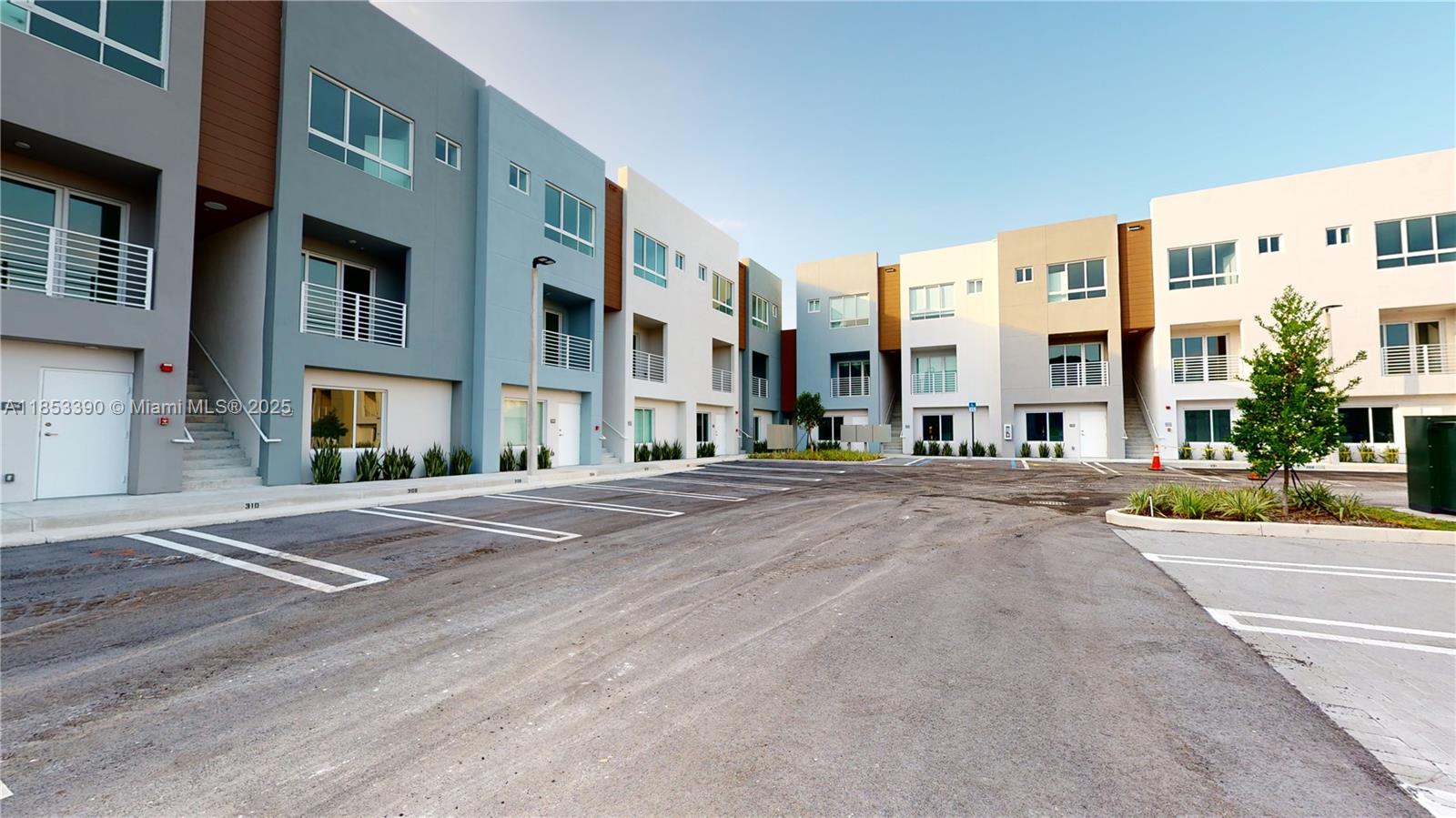 Modern 2-bedroom, 2.5-bathroom + Den unit offering contemporary comfort. This two-story unit is located on the second floor of the building. The entry level features a modern kitchen with quartz countertops and state-of-the-art stainless steel appliances, a living and dining room, a balcony, and a half bathroom. Upstairs, you'll find two bedrooms (master with en-suite bathroom and walk-in closet), built-in closets, a corridor bathroom with a tub, a den, and a laundry center. The unit boasts laminate wood floors throughout, with tiles in the bathrooms. Includes 1 assigned parking space. The complex offers a pool and barbecue area, with an excellent location close to Aventura and easy access to I-95.